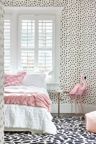 Captivating bedroom interior in Virginia Highlands featuring black and white spotted wallpaper by Beauty Is Abundant