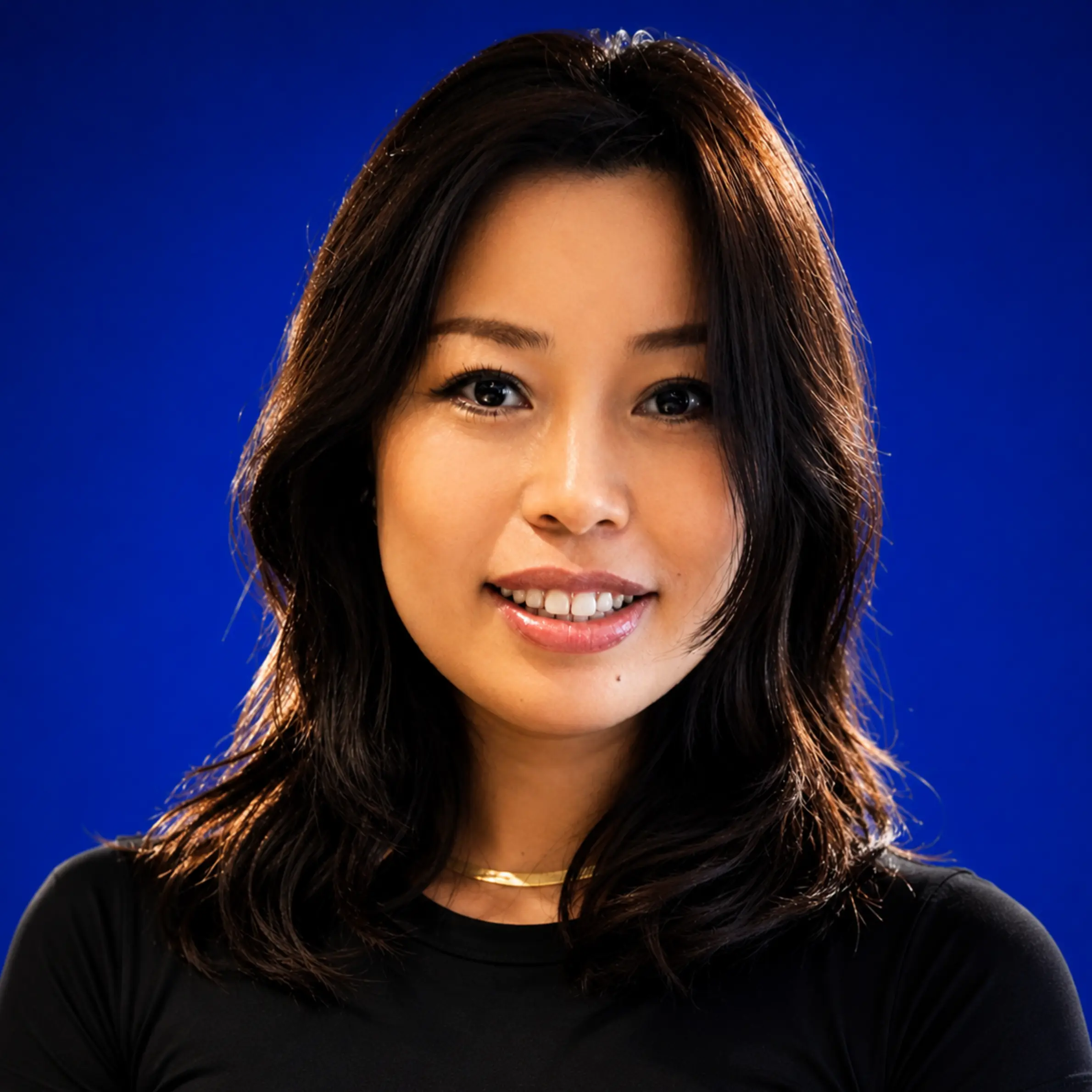 Fiona Jinhong Dou, LMT, Elite Sports Massage Therapist at Elite Healers Sports Massage, specializing in Shiatsu, Tuina, Deep Tissue, Myofascial Release, and Trigger Point Therapy for NYC athletes and Midtown professionals from 120 East 56th Street, Suite 420, New York, NY 10022