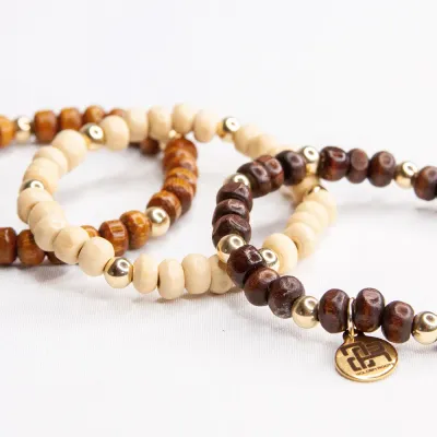 Infuse a touch of natural charm into your style with our Wood Beaded Bracelet, available online