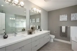 Explore the meticulously crafted luxury bathroom interior at AURA 2 Custom Home by Noura Homes