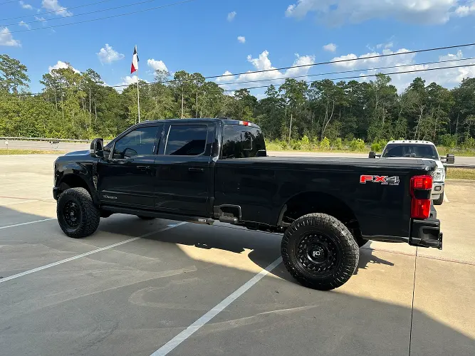 Discover the unparalleled appeal of Texas Truck Works custom Ford vehicle in this captivating photo