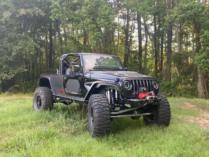 Behold the stunning custom Jeep in this captivating photo, captured by the skilled team at Texas Truck Works