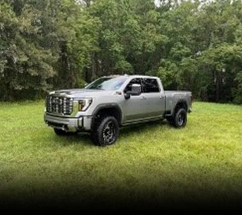 Behold the excellence of custom GMC vehicle in this captivating photo, captured by Texas Truck Works