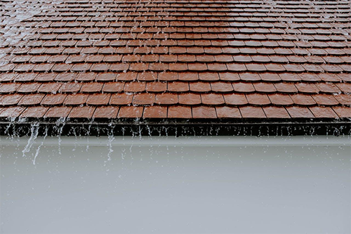 Photo of a roof during rain