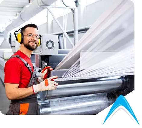 Industrial plastic extrusion equipment in operation