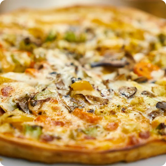 Wood-fired oven cooking Al Forno pizza