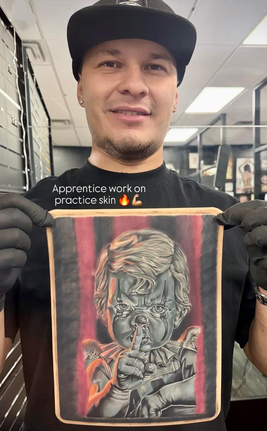 Apprentice learning tattoo machine techniques