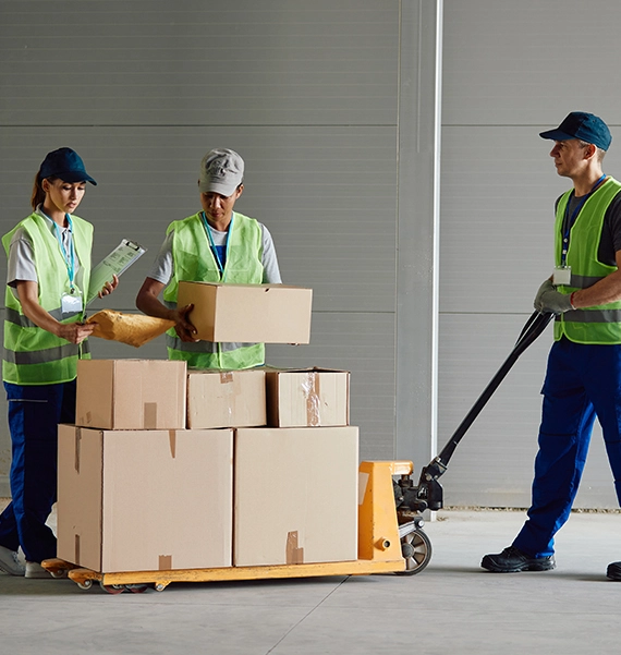 movers in Missouri loading protected furniture into truck