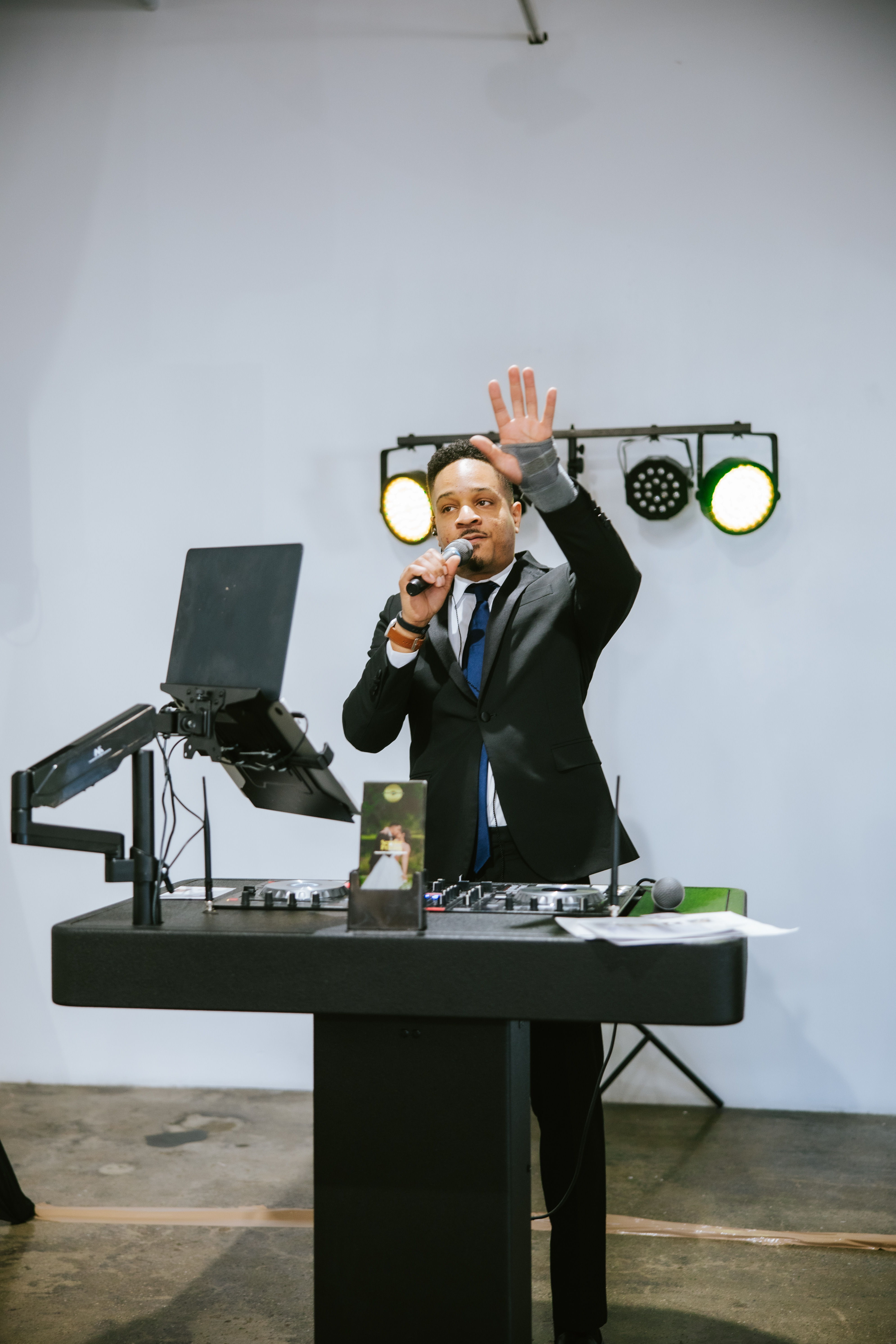 Chicago corporate DJ setting up sound system
