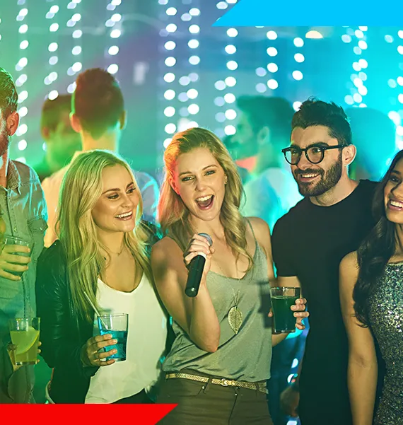 Couple singing a duet during a wedding karaoke session in Greensboro, NC