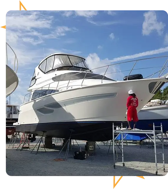 Professional yacht detailers polishing yacht exterior
