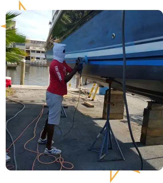 Mobile boat detailing technician working dockside