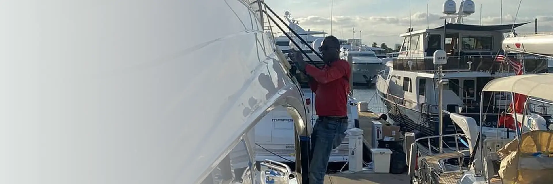 Luxury boat detailing service at a South Florida marina