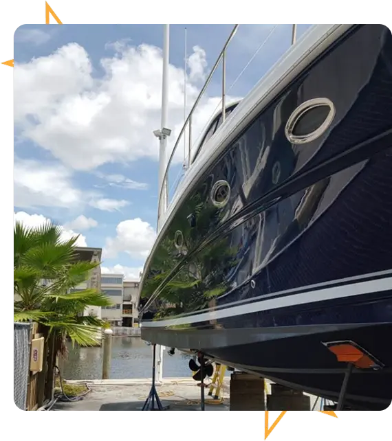 Ceramic coating specialist applying protection to yacht
