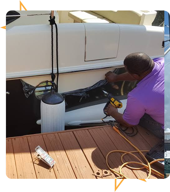 Professional boat cleaning at West Palm Beach dock
