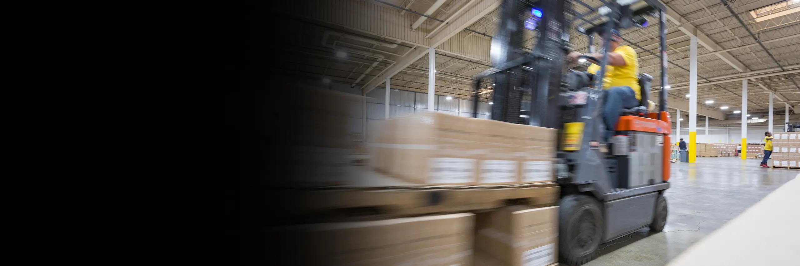 Subscription packages staged for shipment using auto-ship fulfillment solutions in Cincinnati.