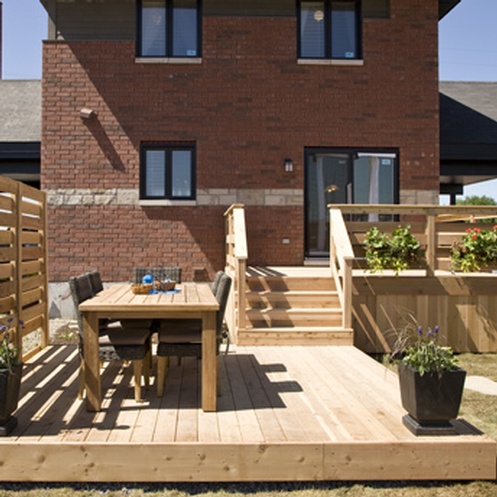 Split-level-deck-treated-wood-backyard